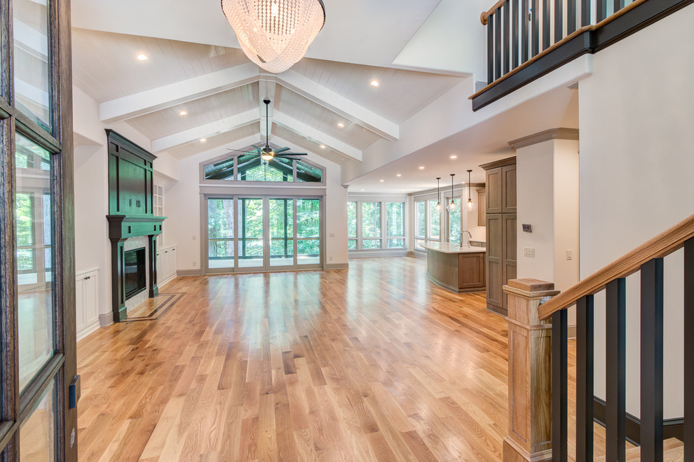 Single front door - single front door idea in Raleigh with white walls and a dark wood front door