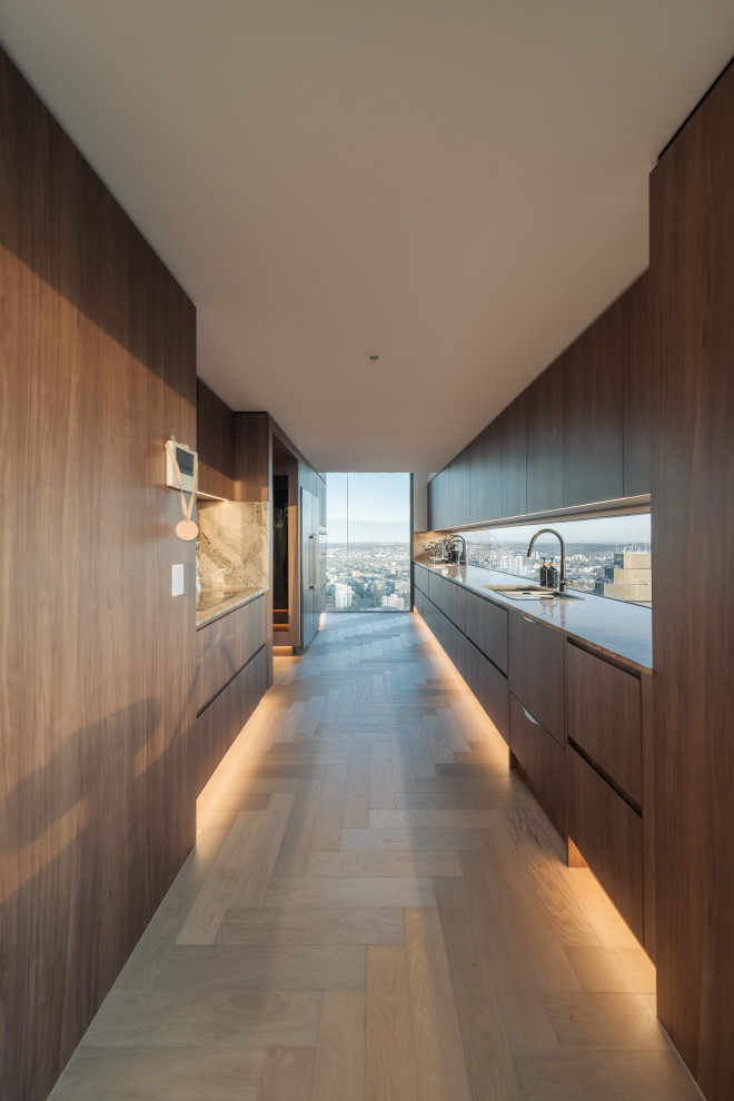Large contemporary kitchen in Brisbane with quartzite benchtops.