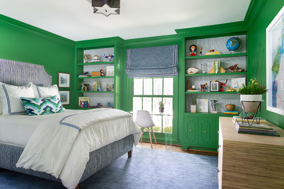 This is an example of a transitional kids' room for boys in Dallas with green walls.