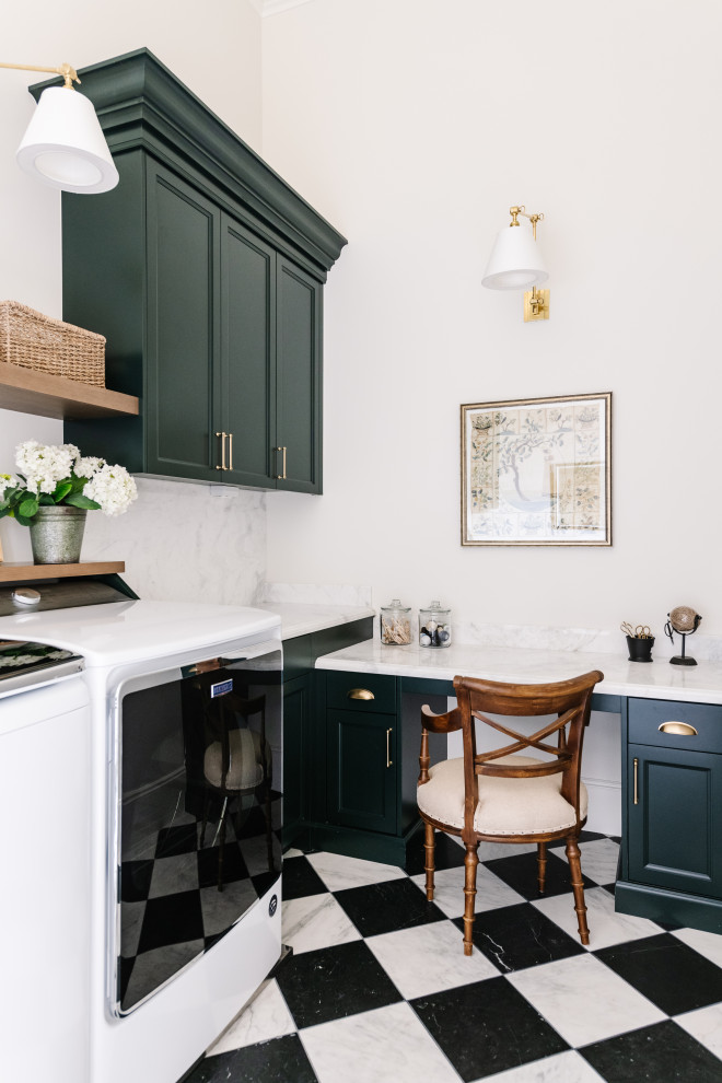 This is an example of a traditional laundry room in Salt Lake City with a drop-in sink, shaker cabinets, green cabinets and marble floors.