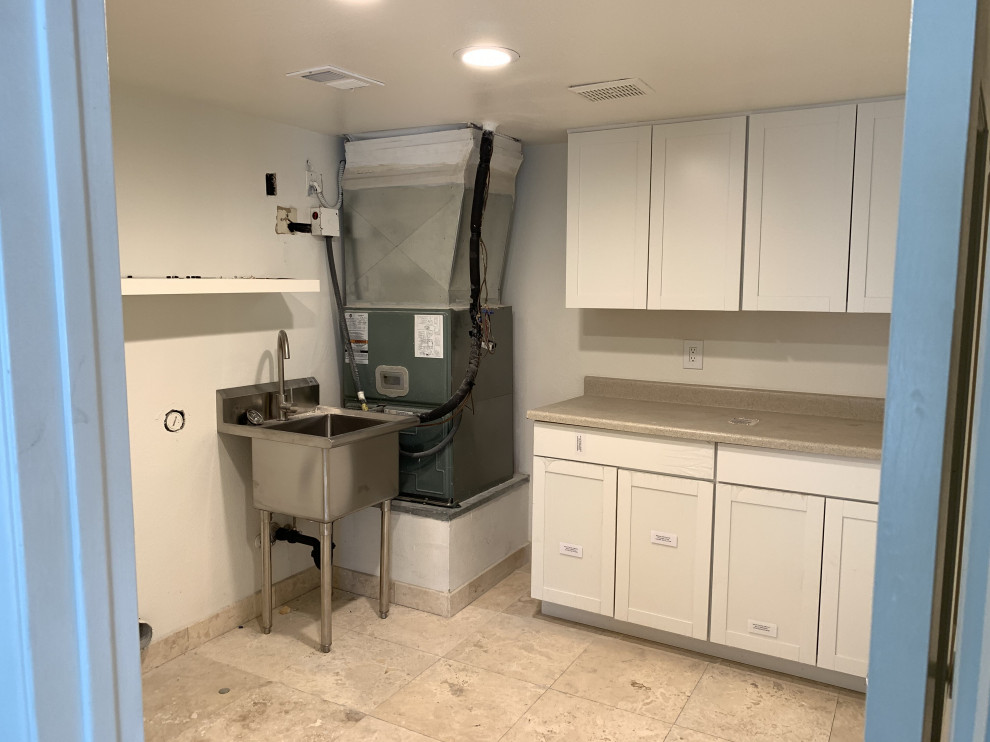 How can I hide this unseemly HVAC unit in my laundry room?