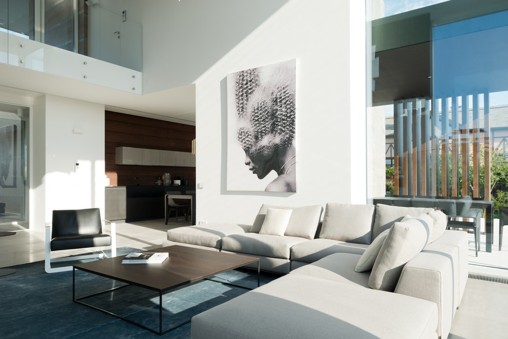 Inspiration for a large contemporary formal open concept living room in Moscow with white walls and porcelain floors.