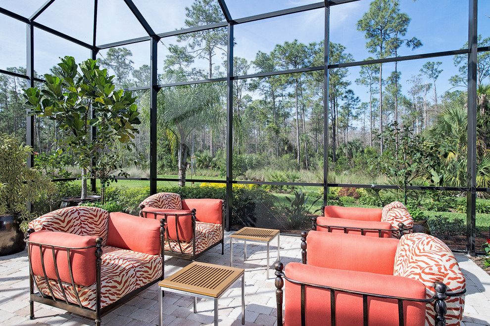 Hot tub - large transitional backyard brick and custom-shaped lap hot tub idea in Miami