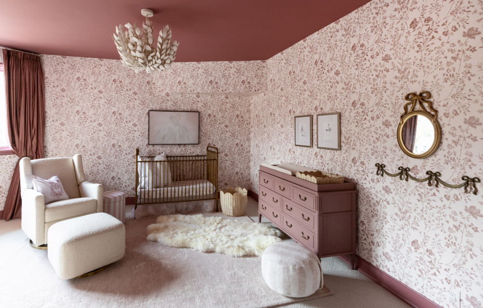 Example of a beach style girl wallpaper, carpeted and beige floor nursery design in Nashville with multicolored walls