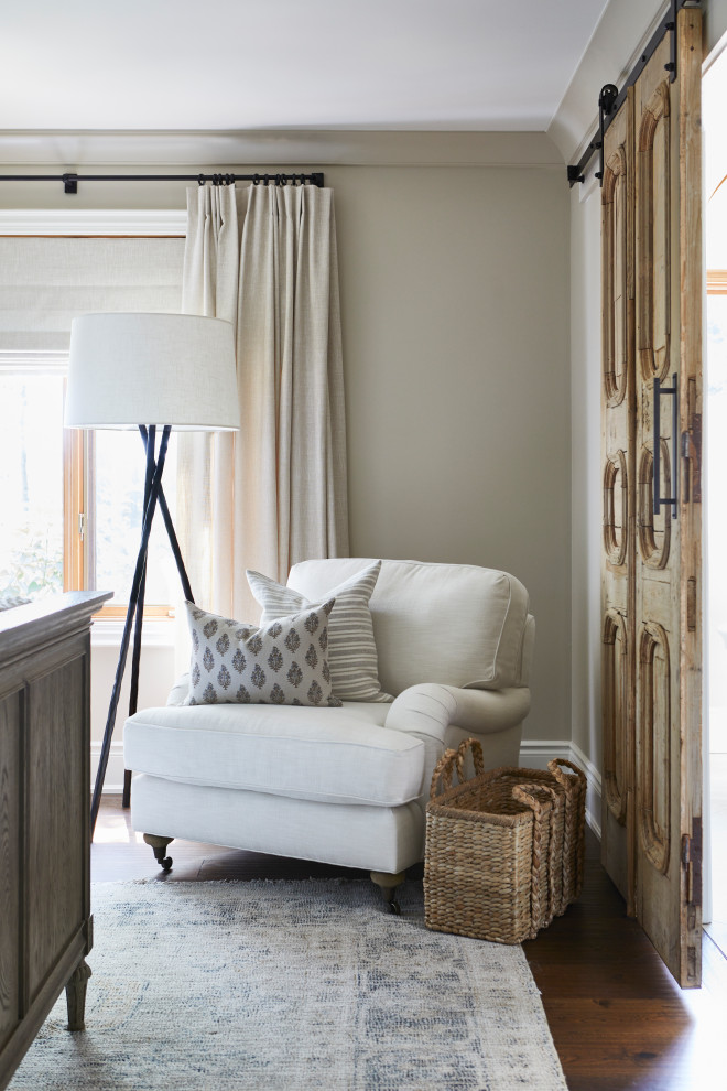 Living room - mid-sized traditional open concept medium tone wood floor and brown floor living room idea in Toronto with beige walls