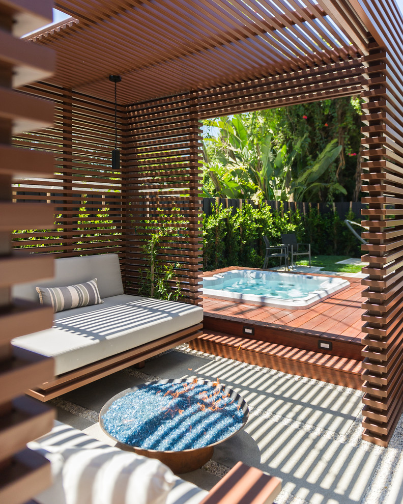 Deck - small contemporary backyard deck idea in Los Angeles with a fire pit and a pergola