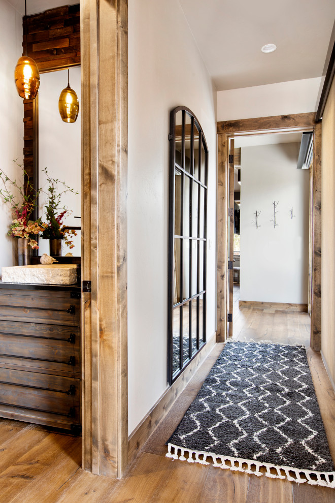 Inspiration for a rustic hallway remodel in Denver