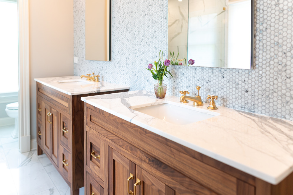 Modern Double Vanity Bathroom with Wooden Cabinets and Elegant Fixtures