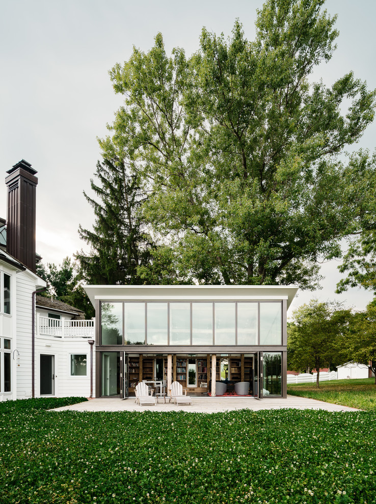 Contemporary white house exterior idea in Other