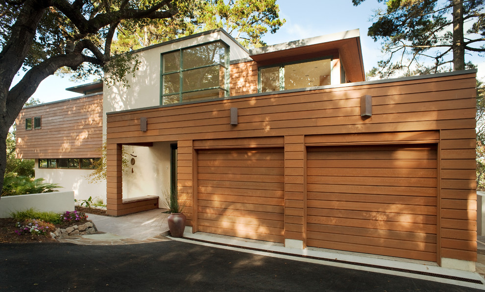 Design ideas for a mid-sized midcentury two-storey brown exterior in San Francisco with mixed siding.