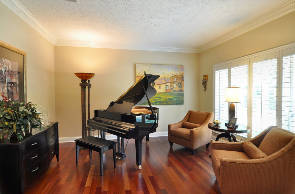 Photo of a traditional living room in Dallas with a music area and medium hardwood floors.