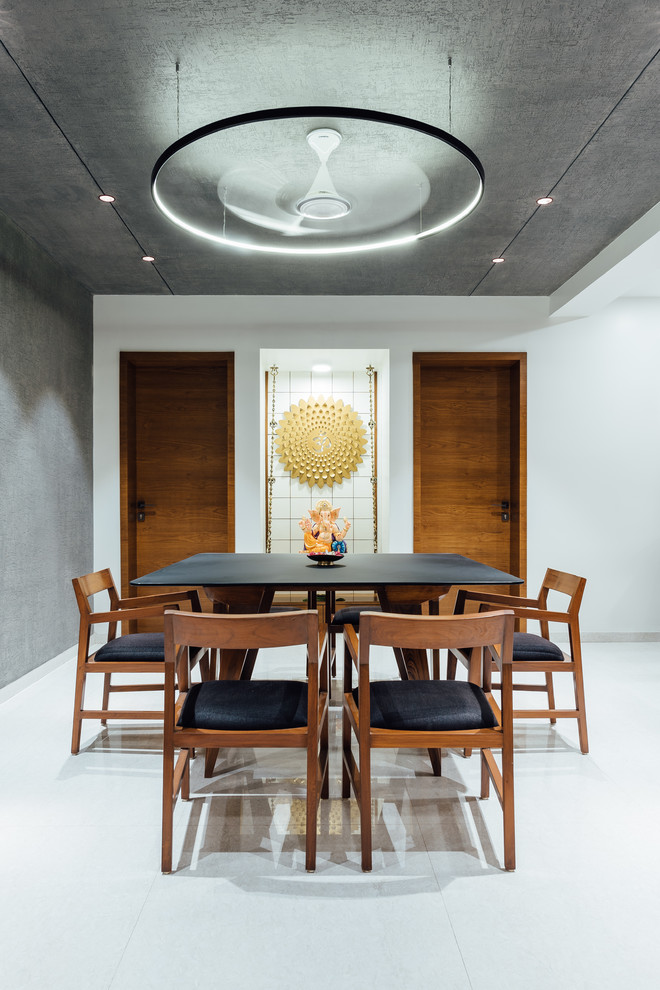 Asian dining room in Other with white walls and white floor.