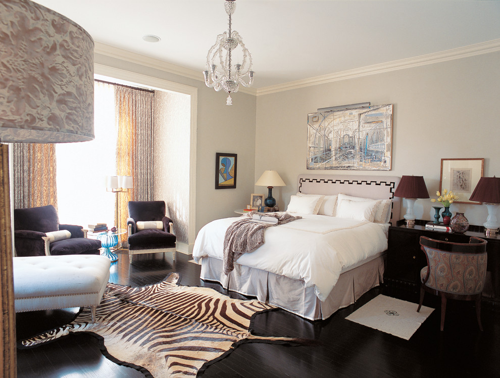 Photo of a traditional bedroom in Chicago with grey walls, dark hardwood floors and black floor.