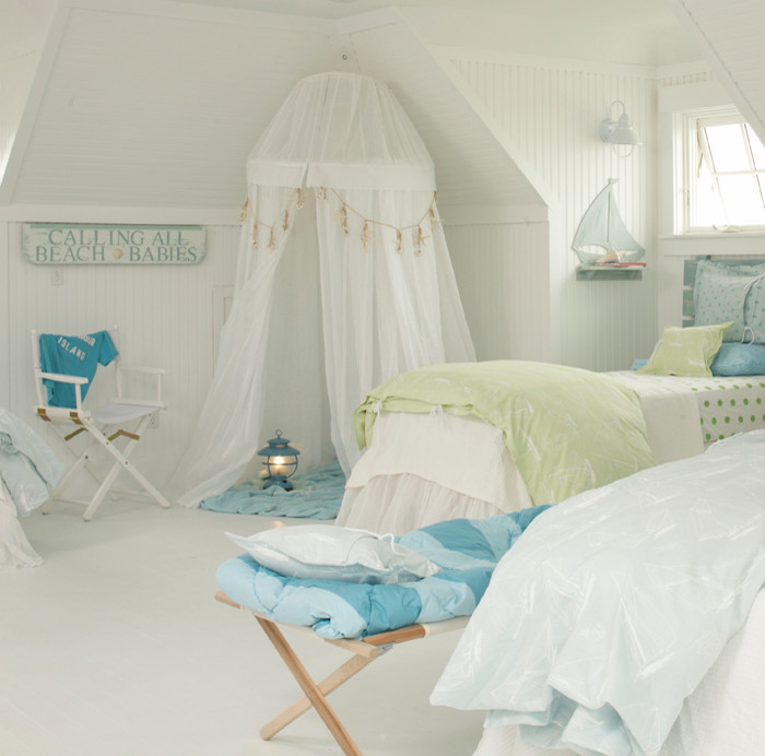 Photo of a mid-sized beach style kids' room for girls in Tampa with beige walls, porcelain floors and white floor.