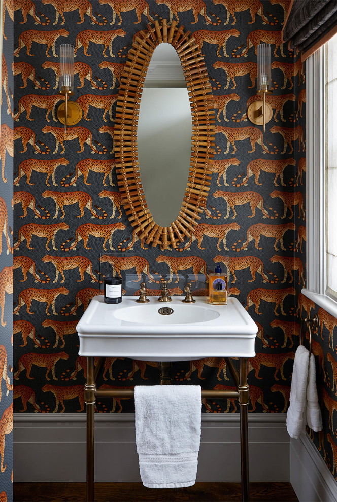 Photo of a traditional powder room in London.