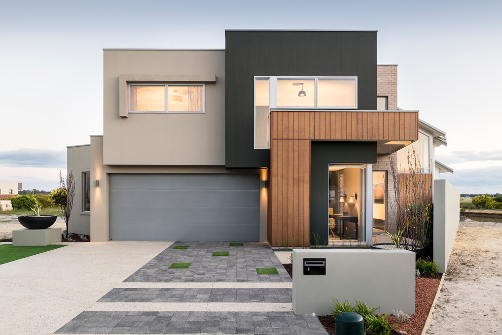 Photo of a contemporary two-storey multi-coloured house exterior in Perth with mixed siding and a flat roof.