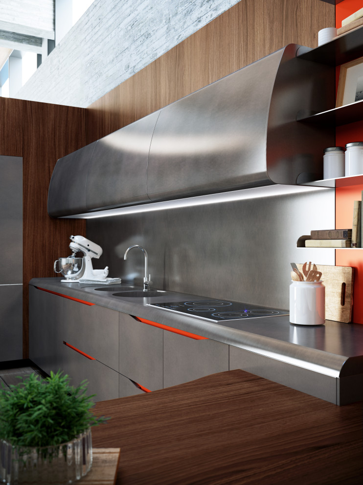 This is an example of a mid-sized modern l-shaped open plan kitchen in Toronto with an undermount sink, flat-panel cabinets, stainless steel cabinets, stainless steel benchtops, metallic splashback, metal splashback, stainless steel appliances, medium hardwood floors, a peninsula, brown floor and grey benchtop.