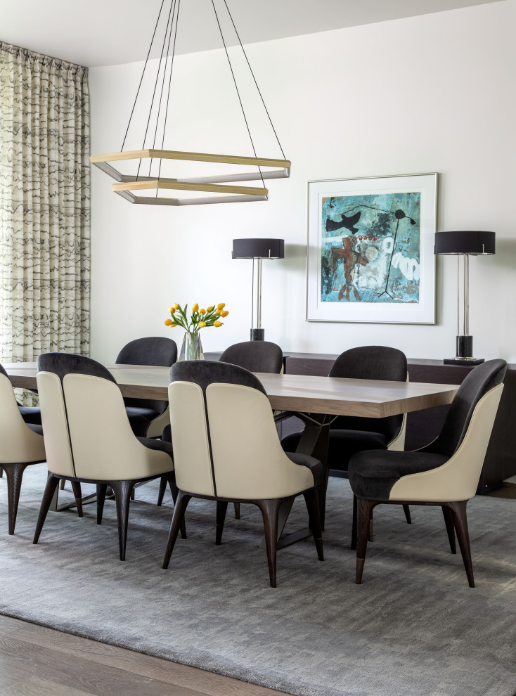Inspiration for an expansive contemporary separate dining room in Houston with white walls.