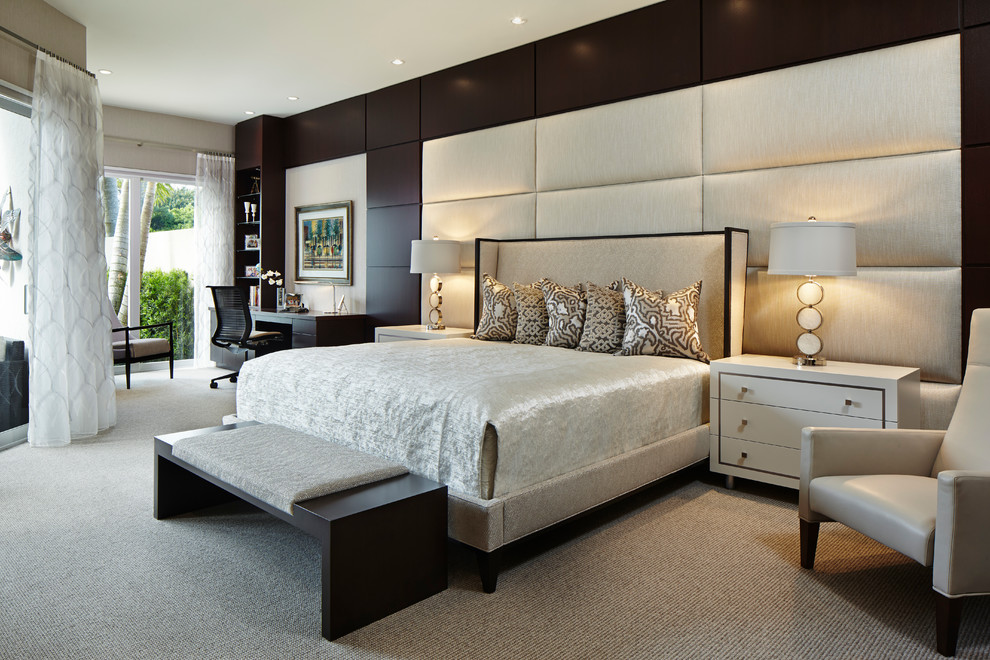 Design ideas for a contemporary master bedroom in Miami with carpet and beige floor.