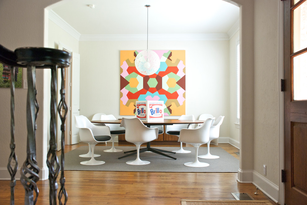 Inspiration for a contemporary dining room in Dallas with white walls and dark hardwood floors.