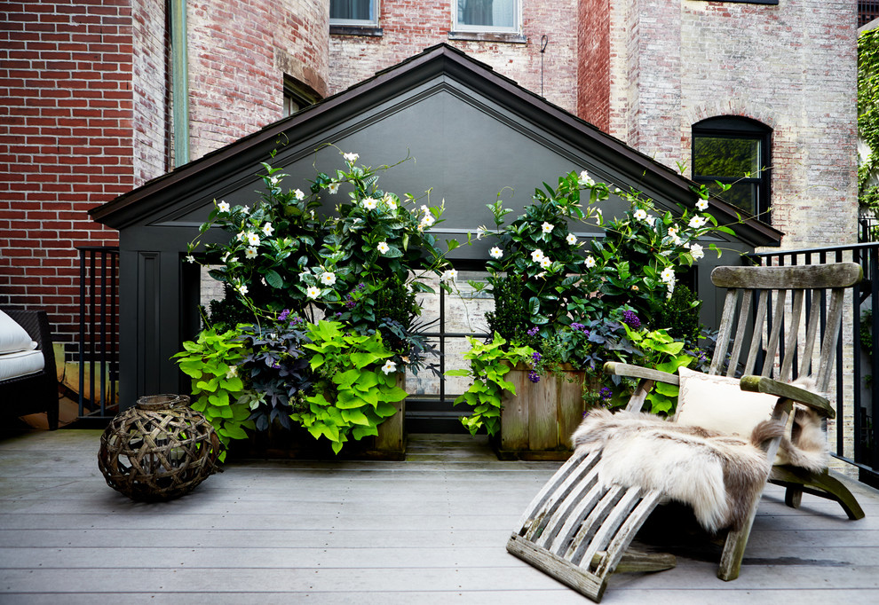 Design ideas for a traditional rooftop and rooftop deck in Boston with a container garden.