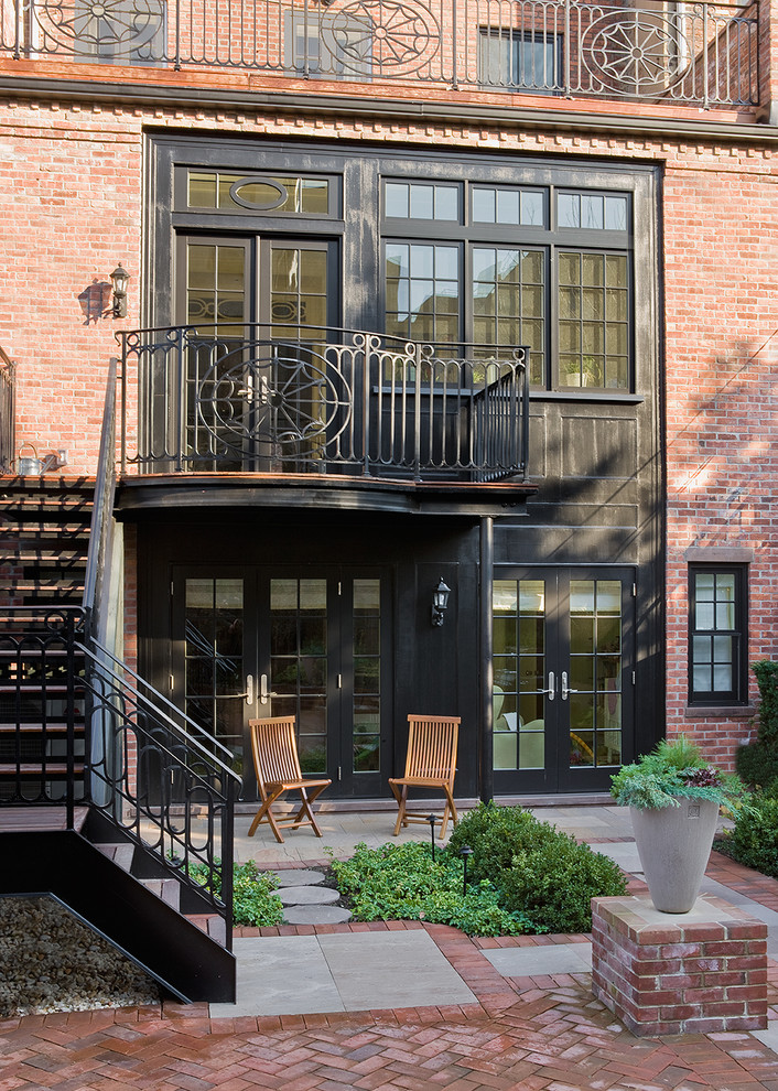 Design ideas for a traditional brick townhouse exterior in New York.