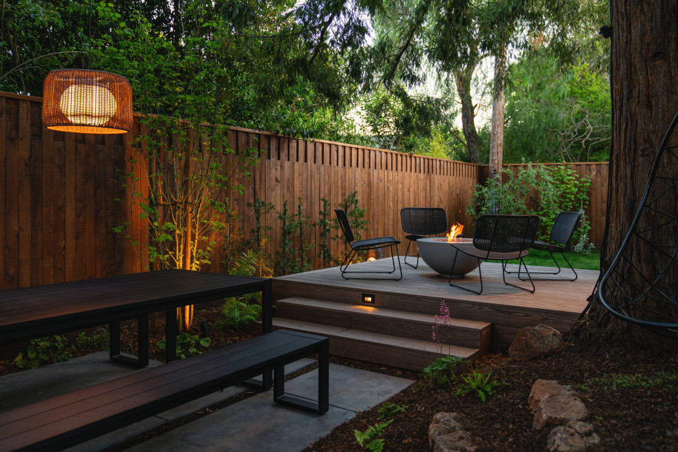 Design ideas for a small contemporary backyard deck in San Francisco with a fire feature.