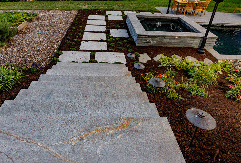 Inspiration for a backyard stone and rectangular hot tub remodel
