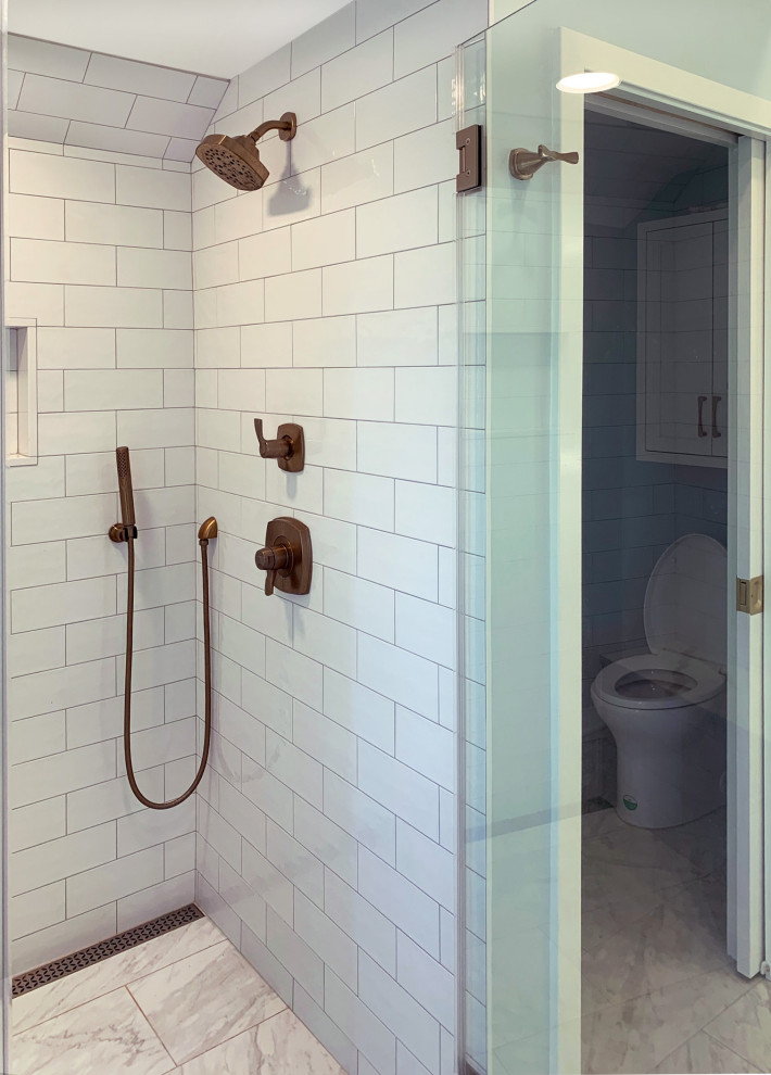 Example of a large trendy master blue tile and subway tile marble floor, gray floor, double-sink and vaulted ceiling bathroom design with a one-piece toilet, blue walls, an undermount sink, quartz countertops, a hinged shower door and white countertops