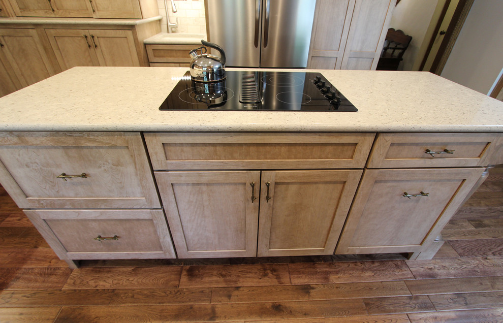 This is an example of a large transitional kitchen in Cleveland.