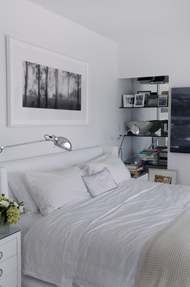Photo of a contemporary bedroom in New York with white walls.