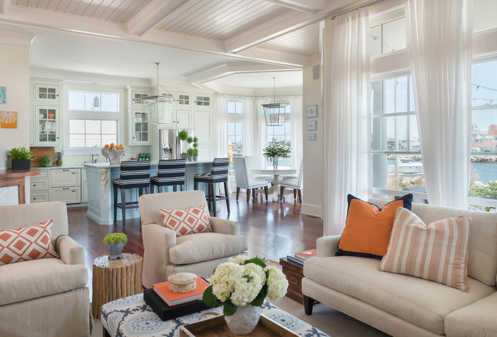 Mid-sized beach style open concept living room in Providence with white walls and medium hardwood floors.
