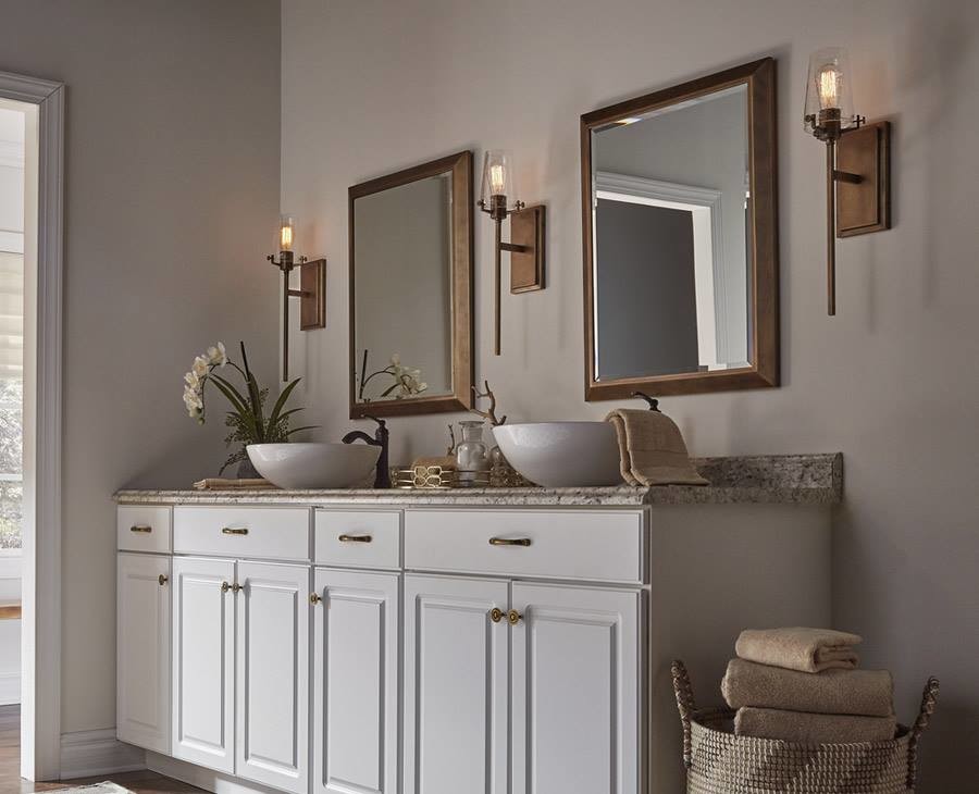 Inspiration for a mid-sized rustic master bathroom remodel with raised-panel cabinets, white cabinets, beige walls, a vessel sink, granite countertops and beige countertops
