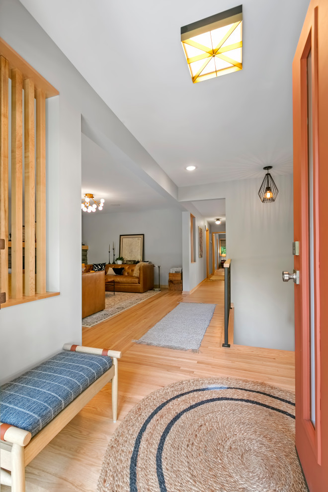 Inspiration for a 1960s light wood floor entryway remodel in Minneapolis