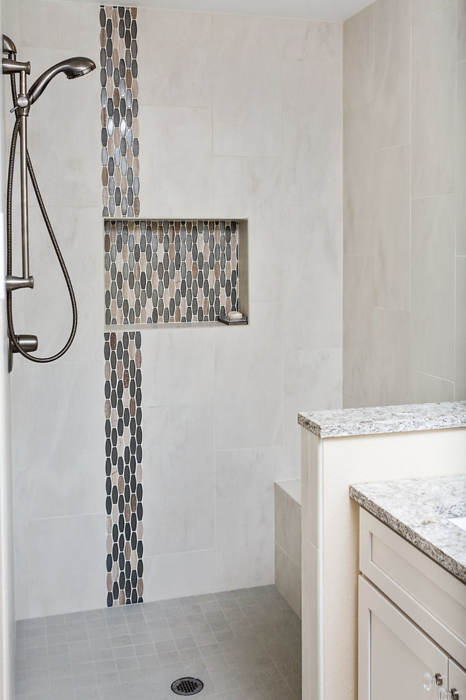Bathroom - transitional bathroom idea with shaker cabinets, white cabinets, beige walls, an undermount sink and quartz countertops