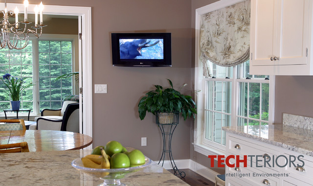 kitchen with tv on wall