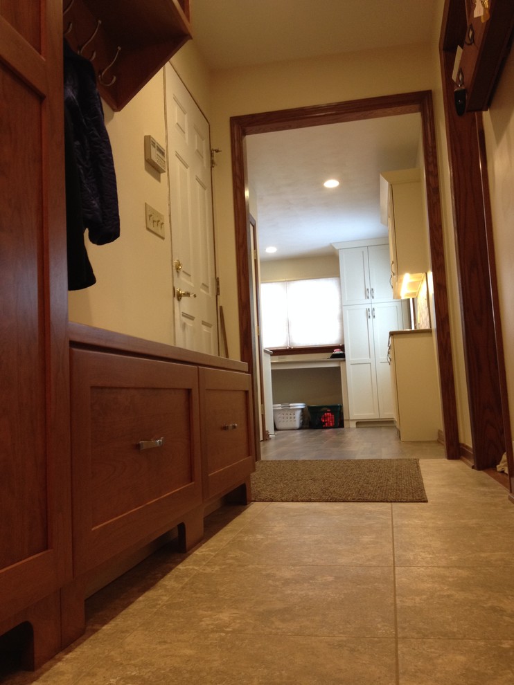Inspiration for a small transitional laminate floor home design remodel with beige walls