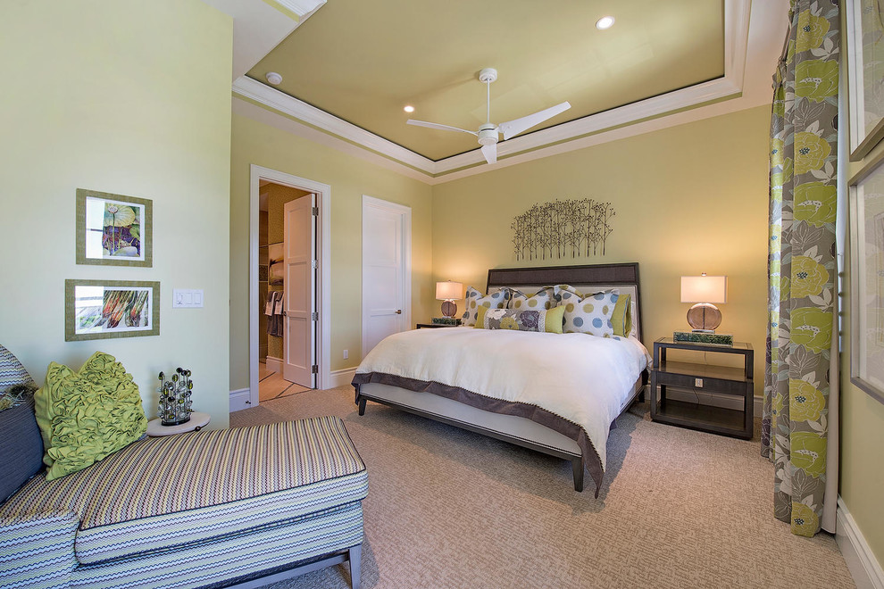 Mid-sized transitional master bedroom in Miami with green walls, carpet and beige floor.