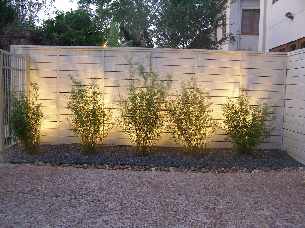 Photo of a contemporary patio in Houston with gravel.