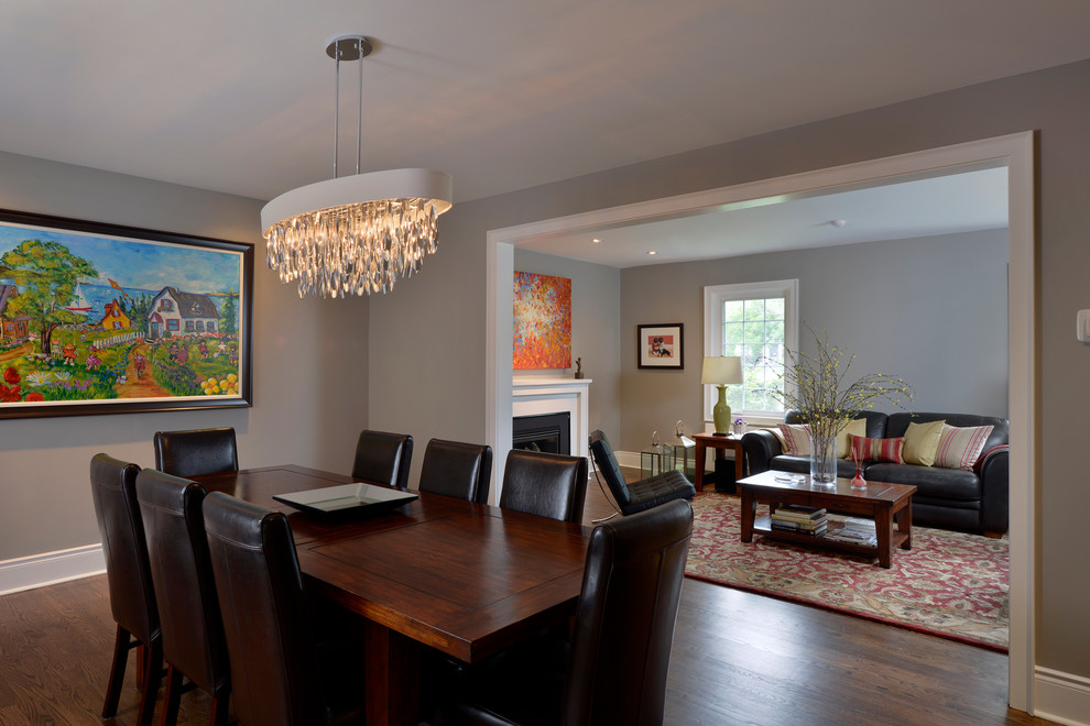 Photo of a transitional separate dining room in Ottawa with grey walls and medium hardwood floors.