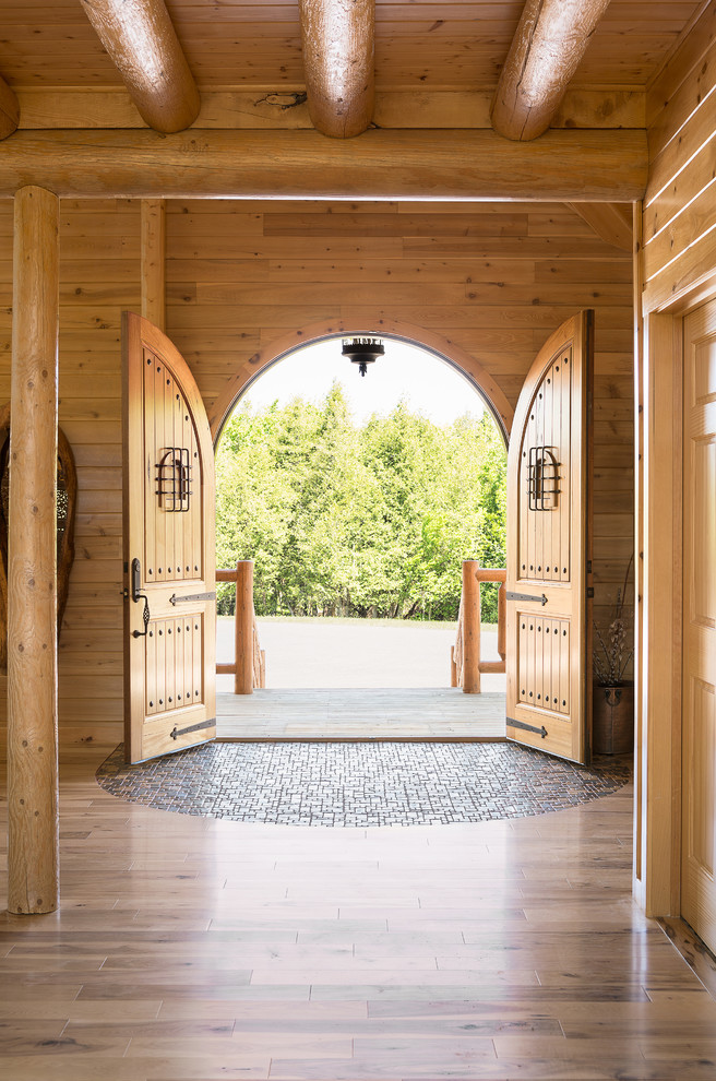 Country entryway in Portland Maine with a double front door.
