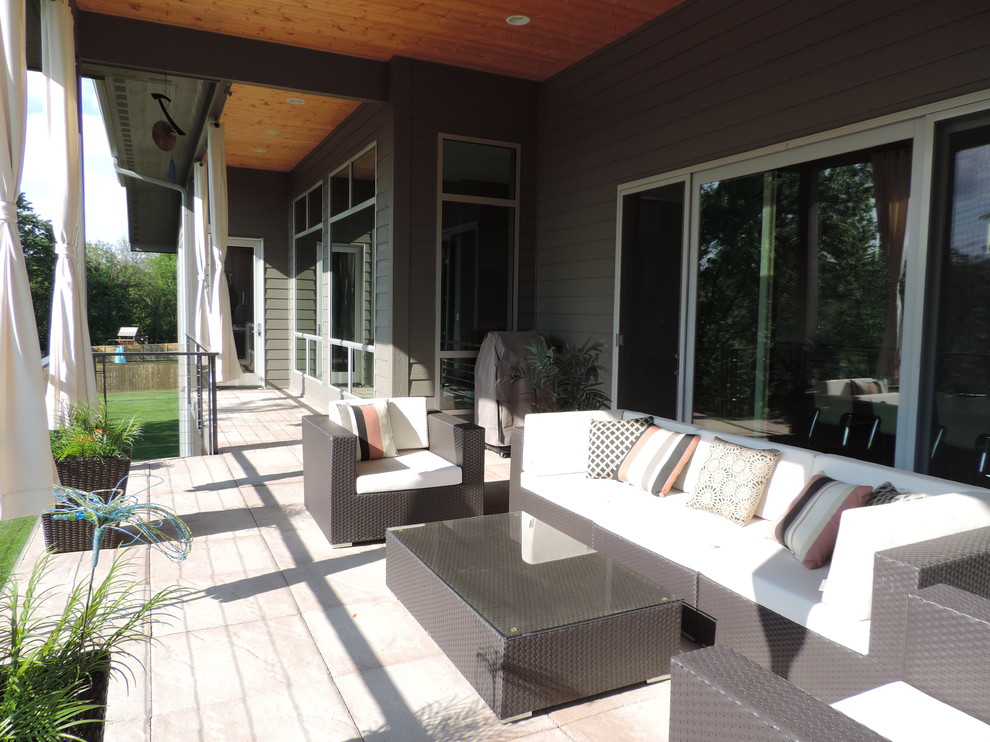 This is an example of a midcentury deck in Other.