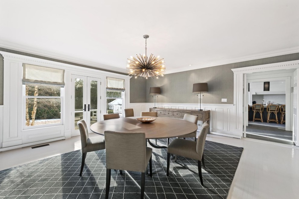 Photo of a mid-sized contemporary separate dining room in New York with grey walls, porcelain floors, no fireplace and white floor.