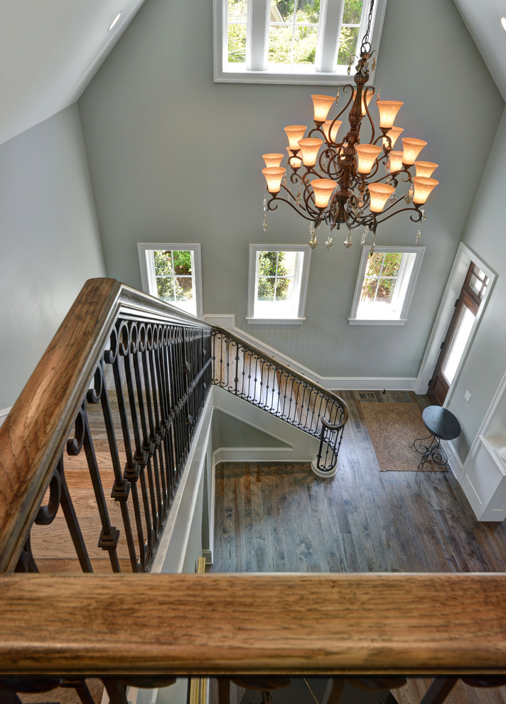 Photo of a large transitional foyer in Charleston with grey walls and medium hardwood floors.