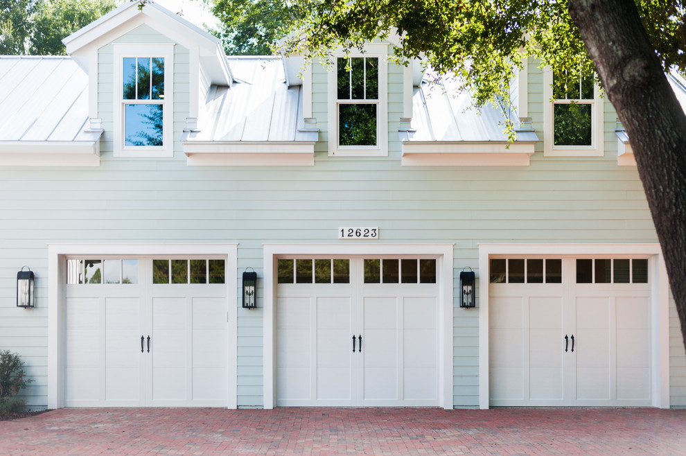 Inspiration for a large coastal garage remodel in Orlando