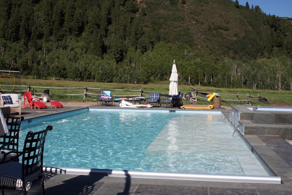 Pool - mid-sized rustic pool idea in Denver