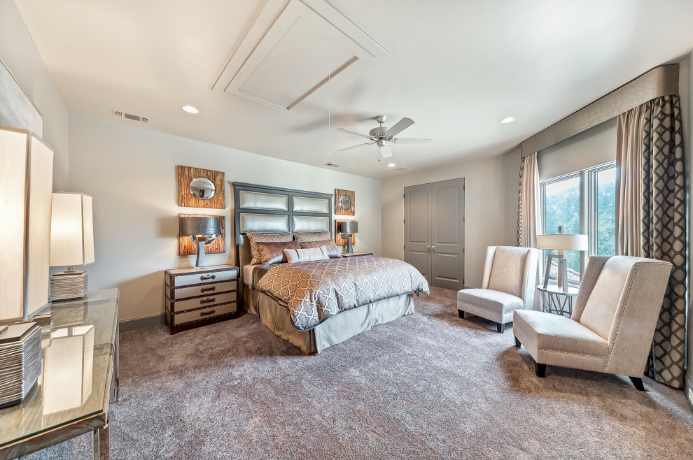 Design ideas for an expansive mediterranean guest bedroom in Dallas with grey walls, carpet and grey floor.