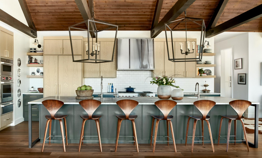 Mountain style kitchen photo in Denver with an island
