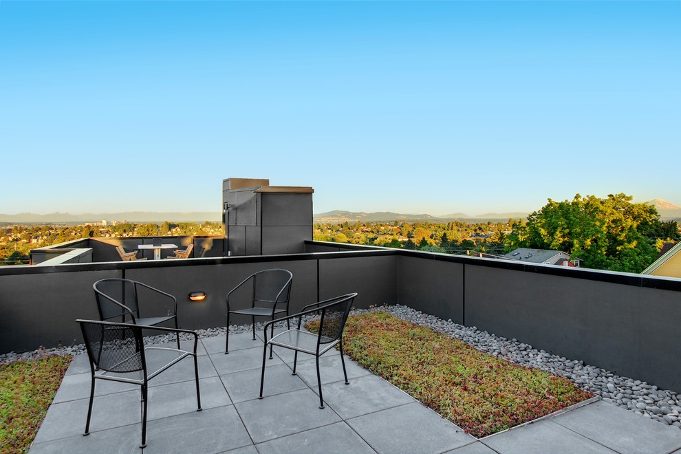 Photo of a contemporary rooftop and rooftop deck in Seattle.