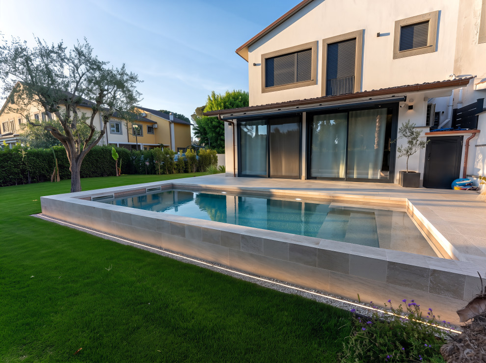 Villetta con piscina e progettazione illuminazione